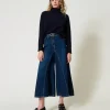 Cropped-Jeans Mit Gürtel