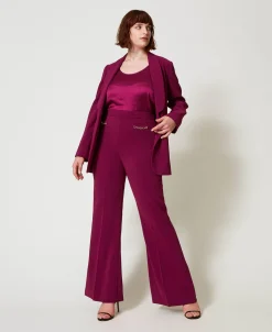 Flare-Hose Mit „Oval T“-Kettchen