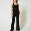 Flare-Jumpsuit Mit „Oval T“-Gürtel