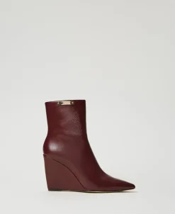 Stiefelette Mit Keilsohle Und Logoplakette