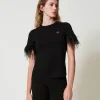T-Shirt Mit „Oval T“-Logo Und Federn